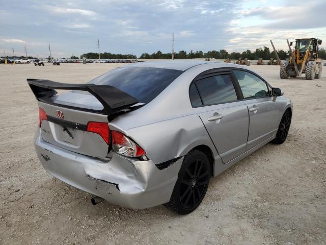 Photo 2 VIN: 19XFA1F54BE030211 - HONDA CIVIC LX 