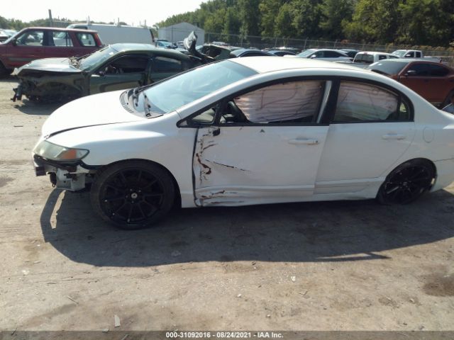 Photo 5 VIN: 19XFA1F54BE044948 - HONDA CIVIC SDN 