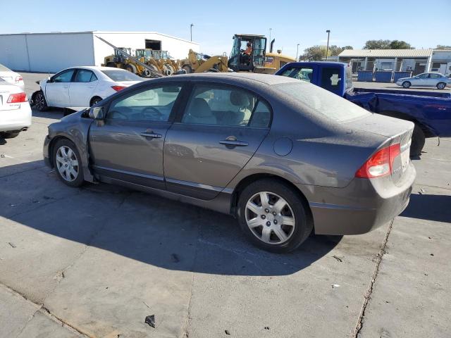 Photo 1 VIN: 19XFA1F55AE014534 - HONDA CIVIC LX 