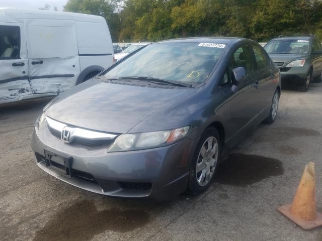 Photo 1 VIN: 19XFA1F55AE034007 - HONDA CIVIC LX 