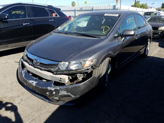 Photo 1 VIN: 19XFA1F55AE055391 - HONDA CIVIC LX 