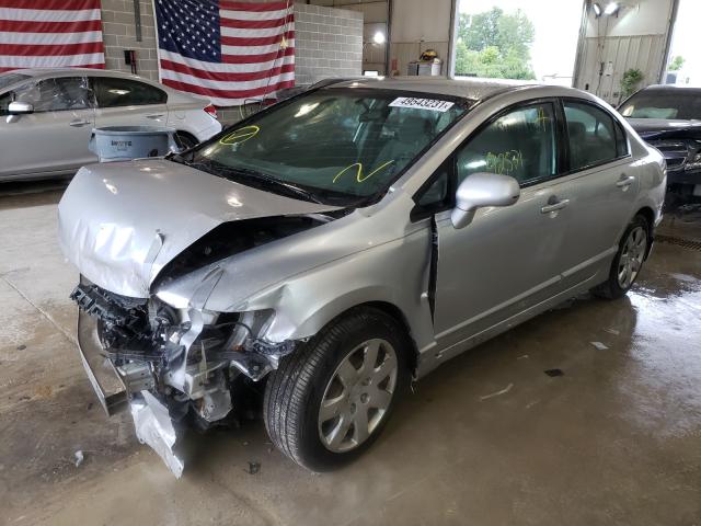 Photo 1 VIN: 19XFA1F55AE075916 - HONDA CIVIC LX 