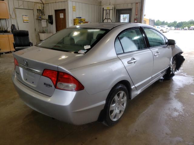 Photo 3 VIN: 19XFA1F55AE075916 - HONDA CIVIC LX 