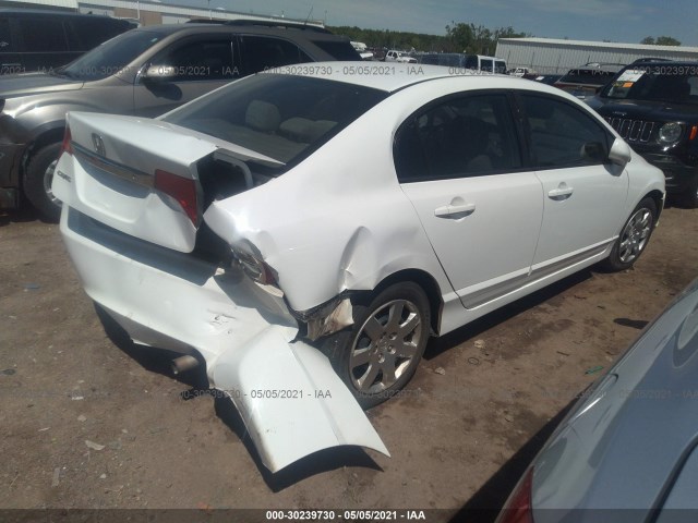 Photo 3 VIN: 19XFA1F56AE021024 - HONDA CIVIC SDN 