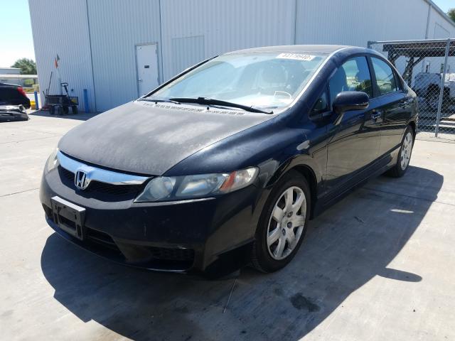 Photo 1 VIN: 19XFA1F56AE021587 - HONDA CIVIC LX 