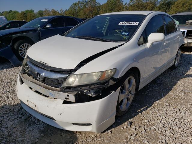 Photo 1 VIN: 19XFA1F56AE042438 - HONDA CIVIC LX 