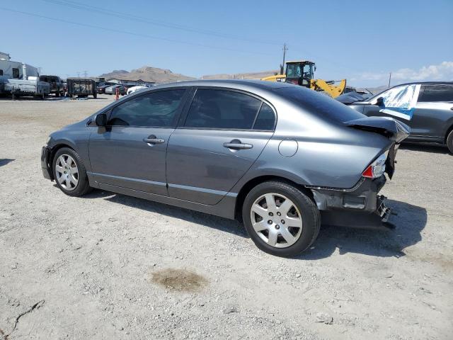 Photo 1 VIN: 19XFA1F56AE045825 - HONDA CIVIC LX 