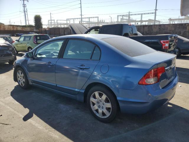 Photo 1 VIN: 19XFA1F56AE070773 - HONDA CIVIC LX 