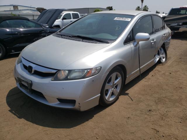 Photo 1 VIN: 19XFA1F56AE073754 - HONDA CIVIC LX 