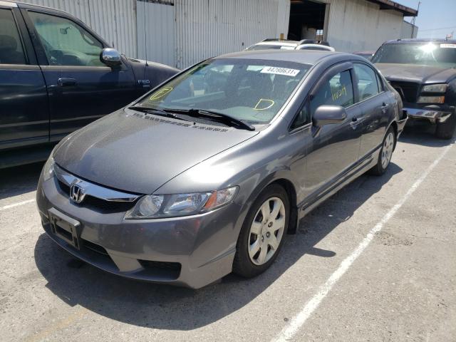 Photo 1 VIN: 19XFA1F56AE077268 - HONDA CIVIC LX 