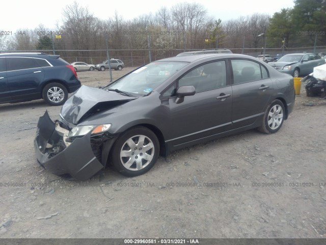 Photo 1 VIN: 19XFA1F56BE034633 - HONDA CIVIC SDN 