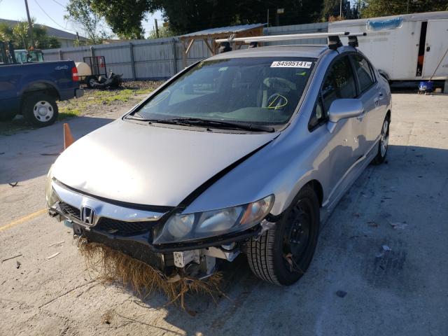 Photo 1 VIN: 19XFA1F56BE037547 - HONDA CIVIC LX 