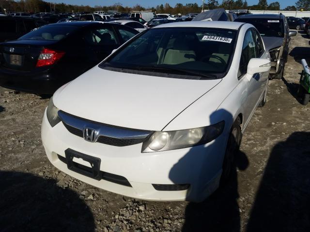 Photo 1 VIN: 19XFA1F56BE041999 - HONDA CIVIC LX 