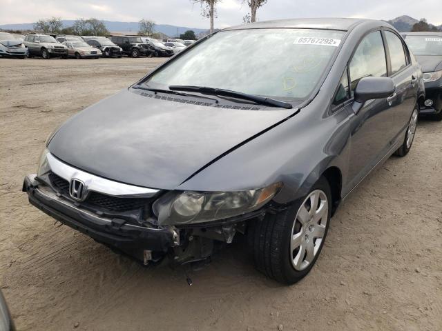 Photo 1 VIN: 19XFA1F57AE002742 - HONDA CIVIC LX 