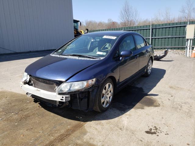 Photo 1 VIN: 19XFA1F57AE027124 - HONDA CIVIC LX 