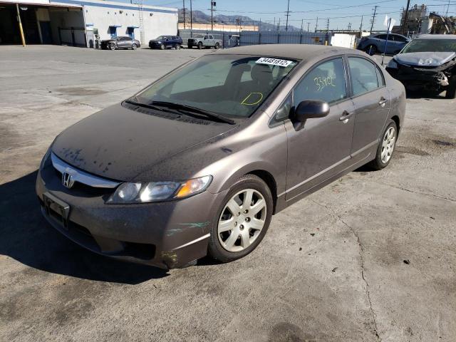 Photo 1 VIN: 19XFA1F57AE029181 - HONDA CIVIC LX 