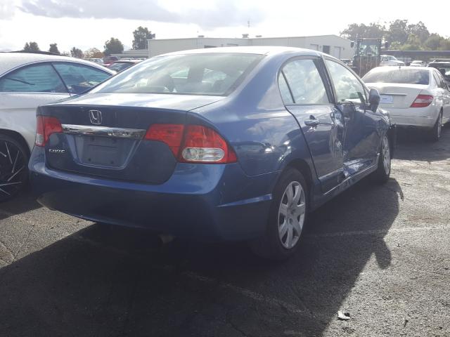 Photo 3 VIN: 19XFA1F57AE049818 - HONDA CIVIC LX 