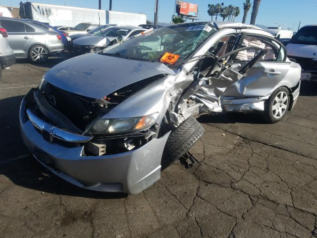 Photo 1 VIN: 19XFA1F57AE081586 - HONDA CIVIC LX 