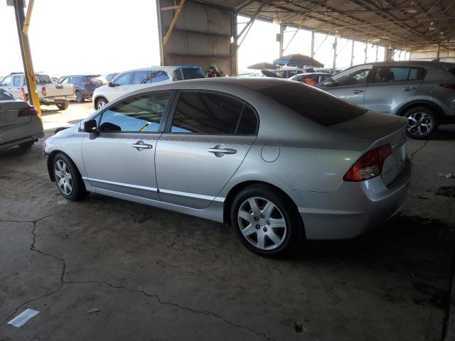 Photo 1 VIN: 19XFA1F58AE015998 - HONDA CIVIC LX 