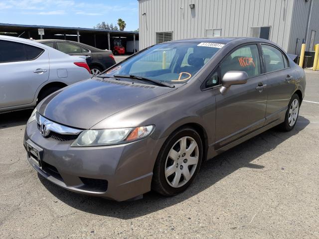 Photo 1 VIN: 19XFA1F58AE054560 - HONDA CIVIC LX 