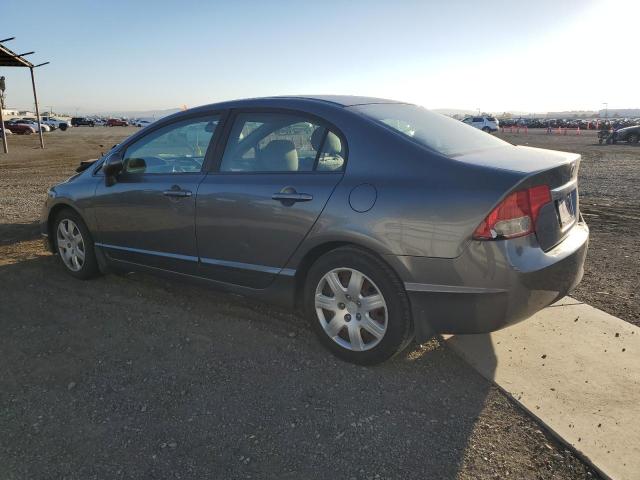 Photo 1 VIN: 19XFA1F59AE004976 - HONDA CIVIC LX 