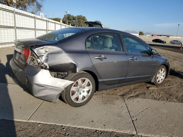 Photo 2 VIN: 19XFA1F59AE004976 - HONDA CIVIC LX 