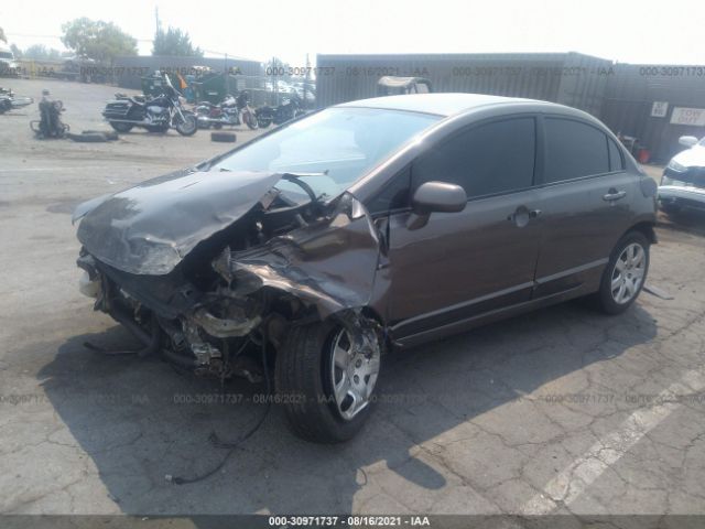 Photo 1 VIN: 19XFA1F59AE030770 - HONDA CIVIC SDN 