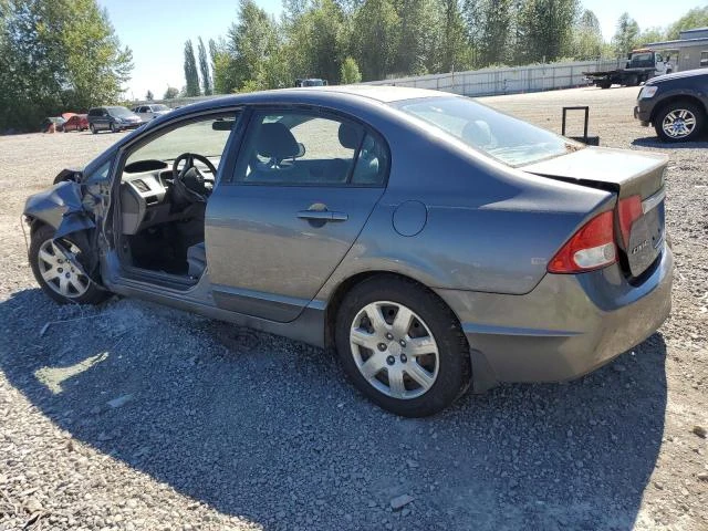 Photo 1 VIN: 19XFA1F59AE034043 - HONDA CIVIC LX 