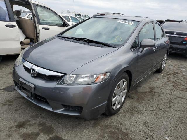 Photo 1 VIN: 19XFA1F59AE057676 - HONDA CIVIC LX 