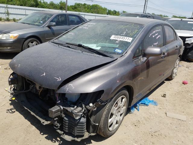 Photo 1 VIN: 19XFA1F59AE058696 - HONDA CIVIC LX 