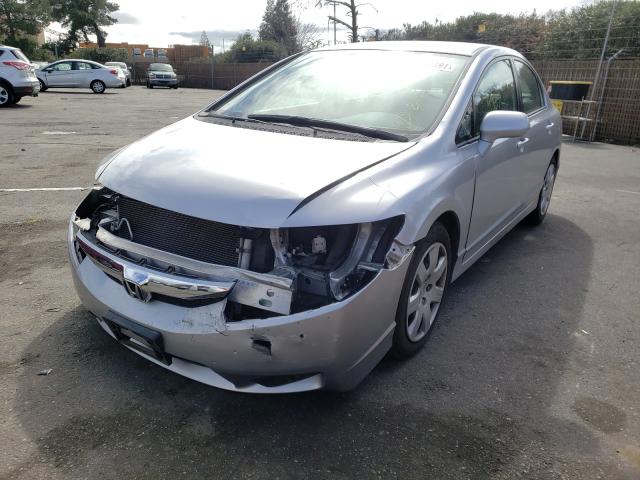 Photo 1 VIN: 19XFA1F5XAE069495 - HONDA CIVIC LX 