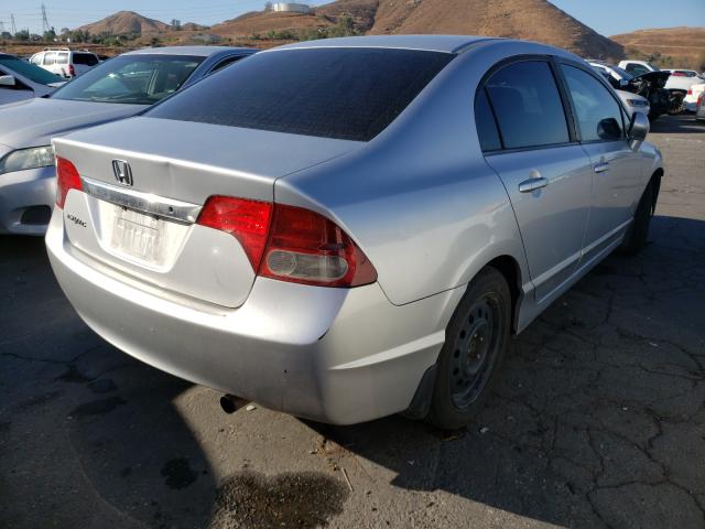 Photo 3 VIN: 19XFA1F5XAE078858 - HONDA CIVIC LX 