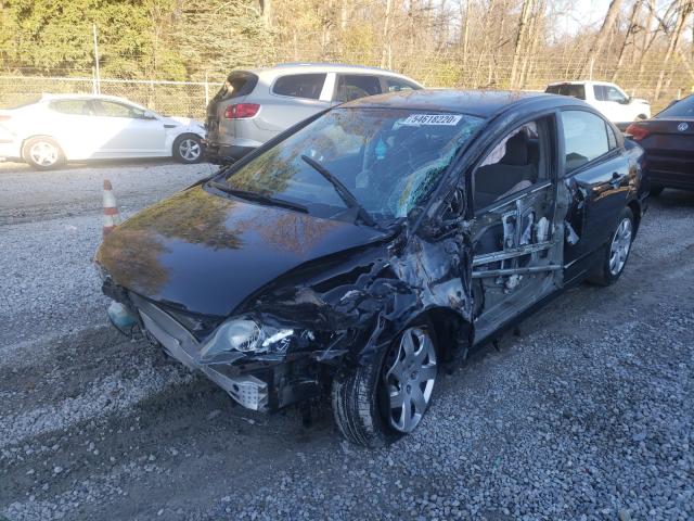 Photo 1 VIN: 19XFA1F5XBE039673 - HONDA CIVIC LX 