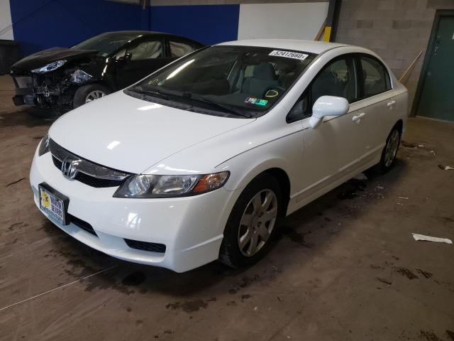 Photo 1 VIN: 19XFA1F5XBE042444 - HONDA CIVIC LX 