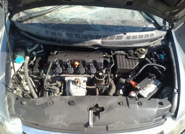 Photo 9 VIN: 19XFA1F6XBE045059 - HONDA CIVIC SDN 