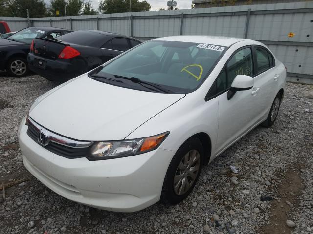 Photo 1 VIN: 19XFB2E51CE034657 - HONDA CIVIC LX 