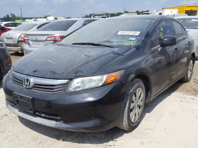 Photo 1 VIN: 19XFB2E51CE064757 - HONDA CIVIC LX 