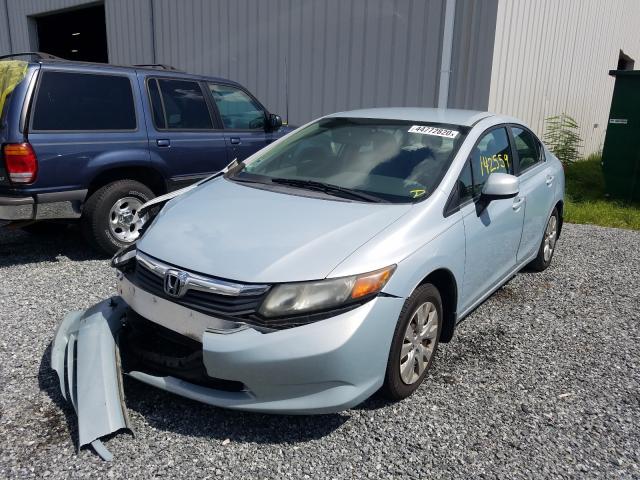 Photo 1 VIN: 19XFB2E52CE042511 - HONDA CIVIC LX 