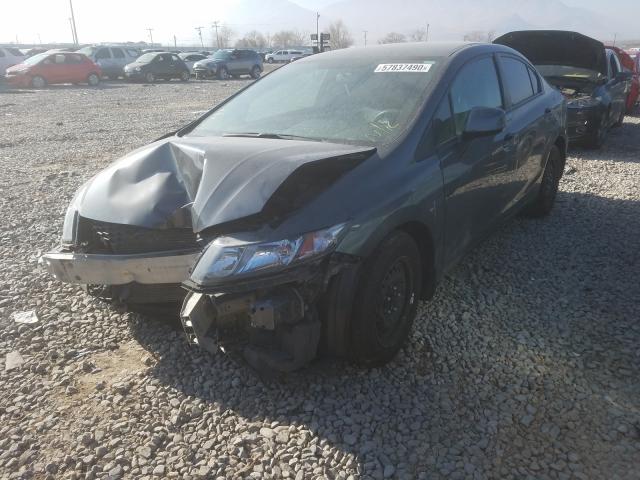 Photo 1 VIN: 19XFB2E55DE098556 - HONDA CIVIC LX 