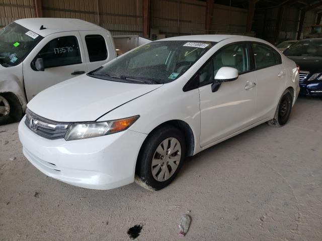 Photo 1 VIN: 19XFB2E56CE064060 - HONDA CIVIC LX 