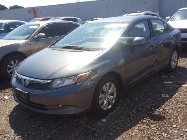 Photo 1 VIN: 19XFB2E57CE034971 - HONDA CIVIC LX 