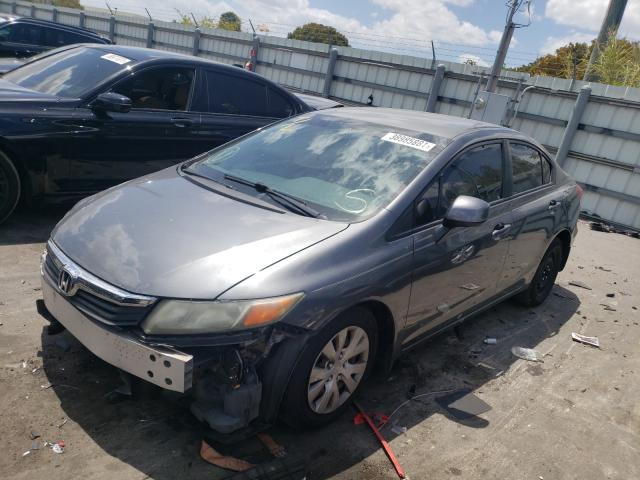 Photo 1 VIN: 19XFB2F50CE094167 - HONDA CIVIC LX 