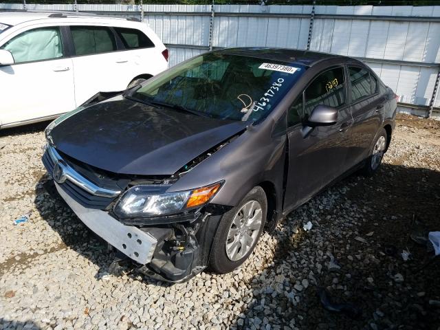 Photo 1 VIN: 19XFB2F50CE110318 - HONDA CIVIC LX 