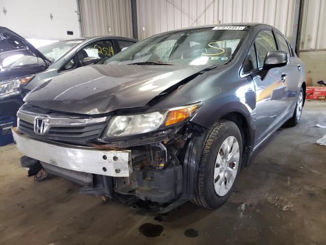 Photo 1 VIN: 19XFB2F50CE325651 - HONDA CIVIC LX 