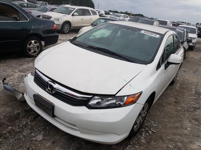 Photo 1 VIN: 19XFB2F50CE334172 - HONDA CIVIC LX 