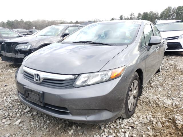 Photo 1 VIN: 19XFB2F50CE371724 - HONDA CIVIC LX 