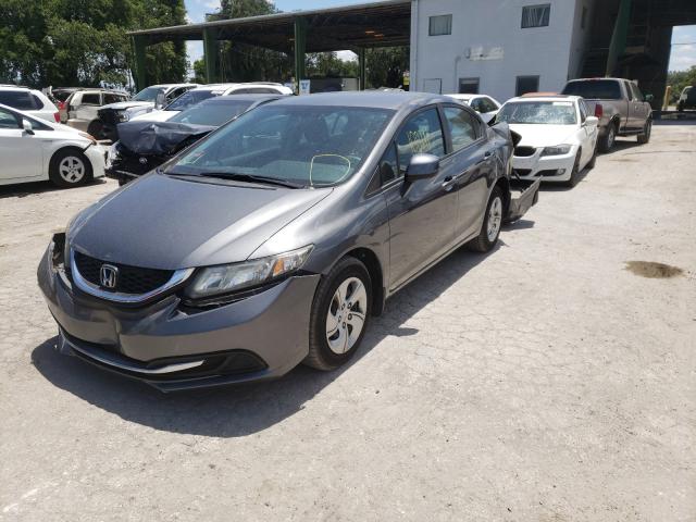 Photo 1 VIN: 19XFB2F50DE099547 - HONDA CIVIC LX 