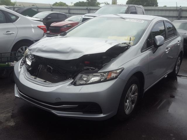 Photo 1 VIN: 19XFB2F50DE100521 - HONDA CIVIC LX 