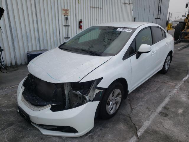 Photo 1 VIN: 19XFB2F50DE255053 - HONDA CIVIC LX 