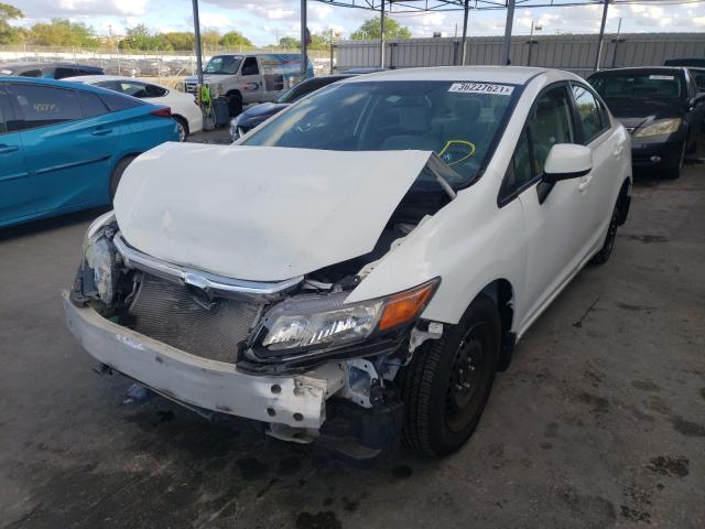 Photo 1 VIN: 19XFB2F51CE014357 - HONDA CIVIC LX 